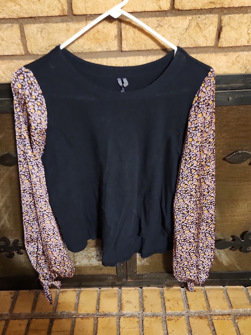 Anthropologie Black Tee with Purple and Yellow Floral Puff Sleeves